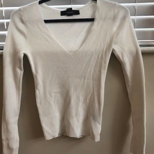 White long sleeved top